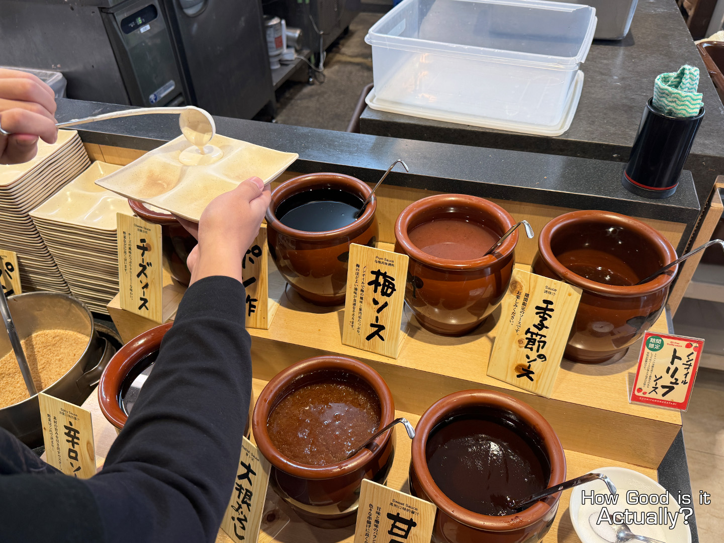 Kushiya Monogatari Grabbing Sauces from the Buffet Lineup
