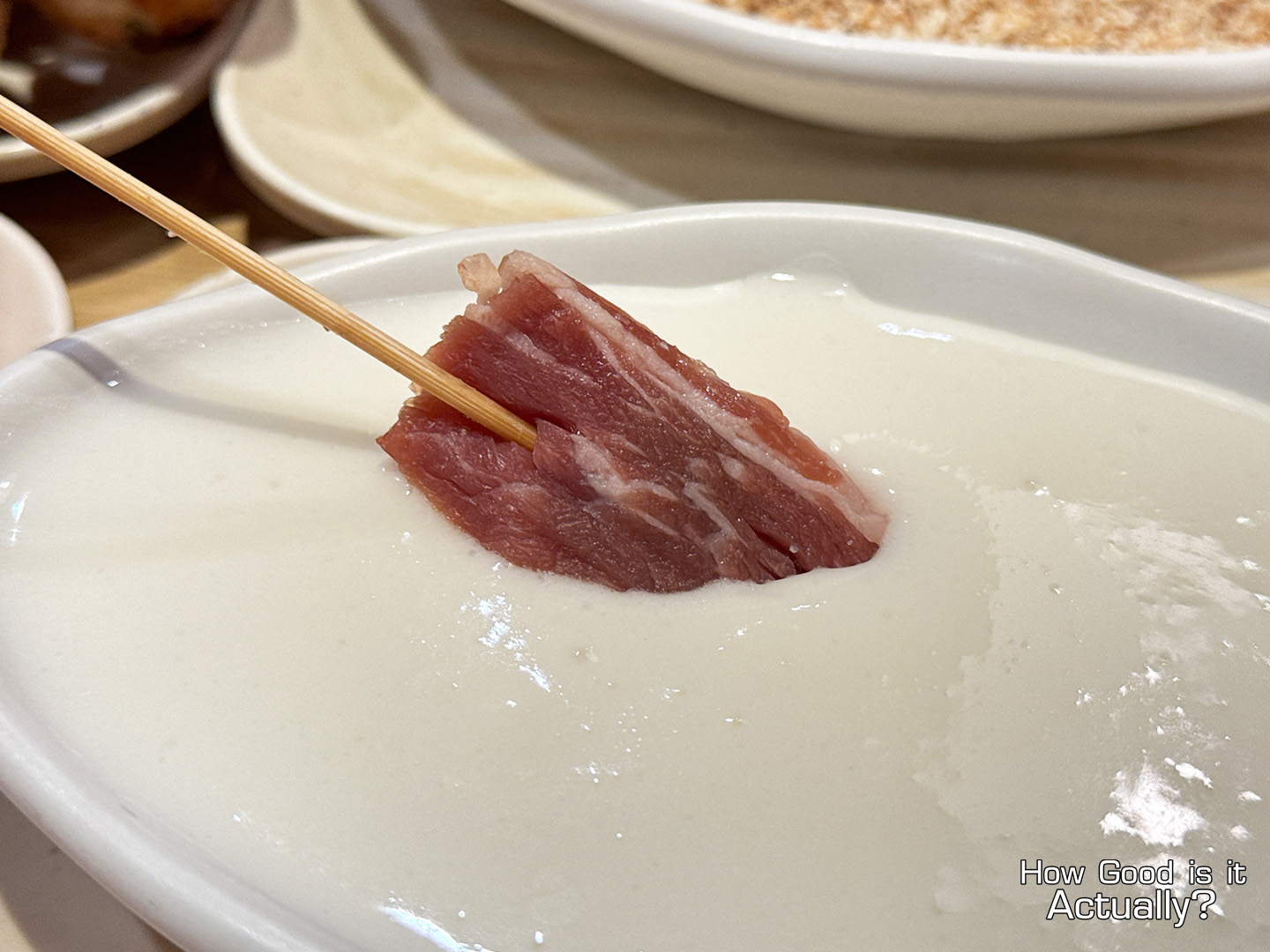 Kushiya Monogatari Dipping Skewer into Batter Mixture
