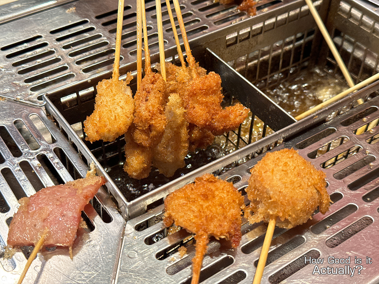 Kushiya Monogatari Assortment of Kushikatsu coming off the fryer
